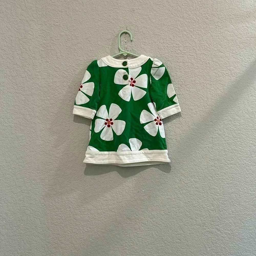 Green gap baby dress size two years white flower pattern green and gold buttons